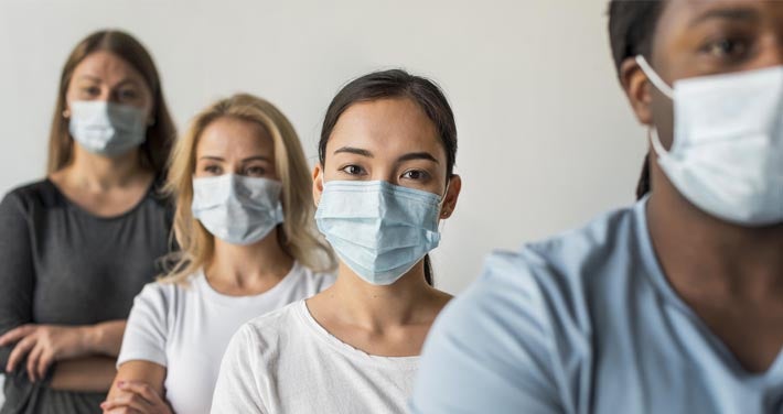 line of people wearing facemasks