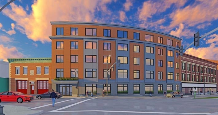 exterior digital mock of Moran Square brick building with blue cloud sky