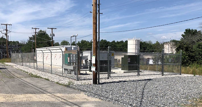 fence enclosed Townsend battery facility exterior view