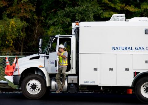 Unitil worker exiting a natural gas truck