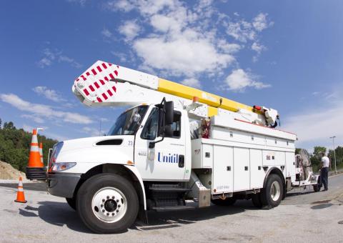Unitil electric truck with safety cones on front